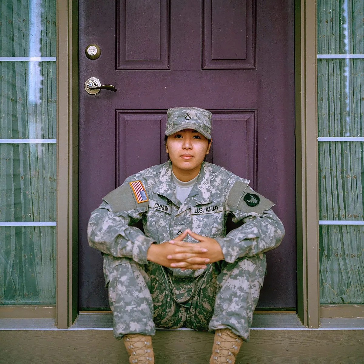 jessica-radanavong-army-veteran-sitting-at-front-door-square